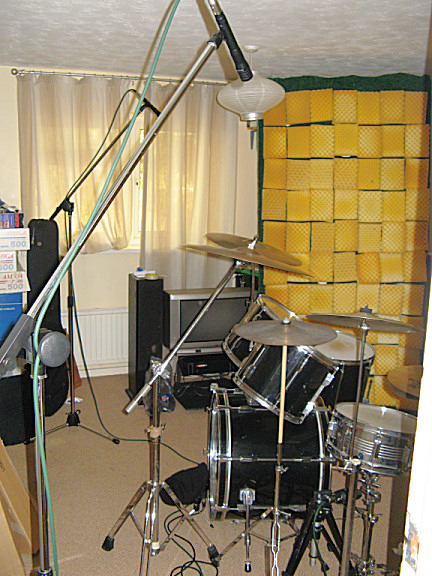 `<br /><br />Even the mike stands hail such a godly-sounding drum kit.<br /><br /><br />_